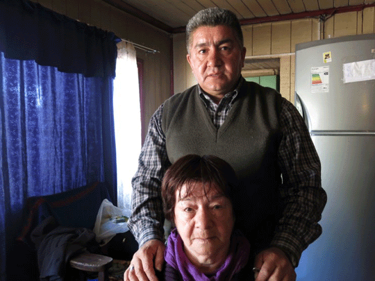 Rudy Hernan and his mother, Haydee Erices, in Collipulli, were driven from their small farm by Mapuche gunmen two years ago